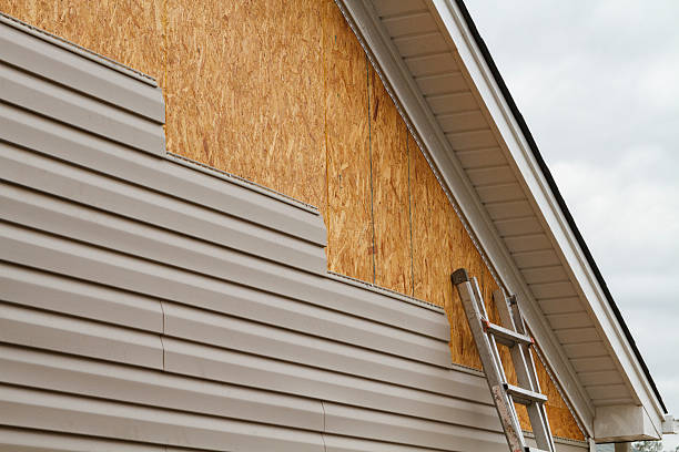 Professional Siding Repair technician working in Jacobs Creek, PA